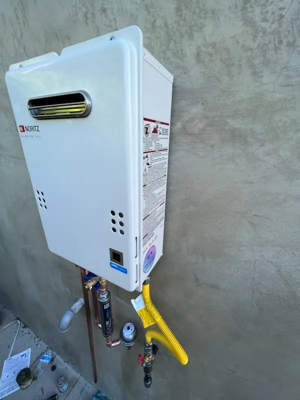 Tankless water heater installation for Plum Grove Village homes